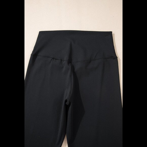 High-waisted crossover flared black leggings - Picture 7 of 10